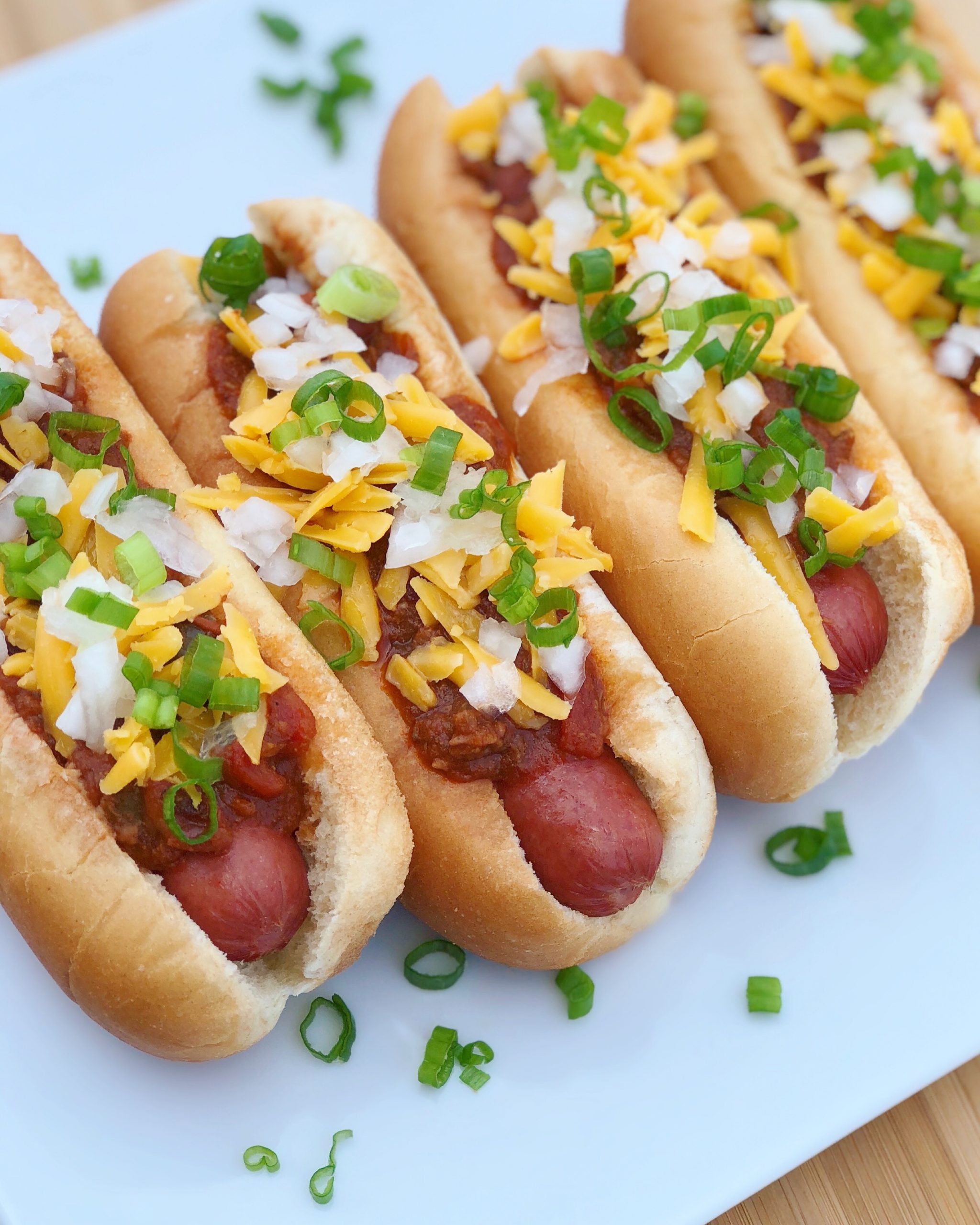 Dish of Chili Cheese Hot Dogs