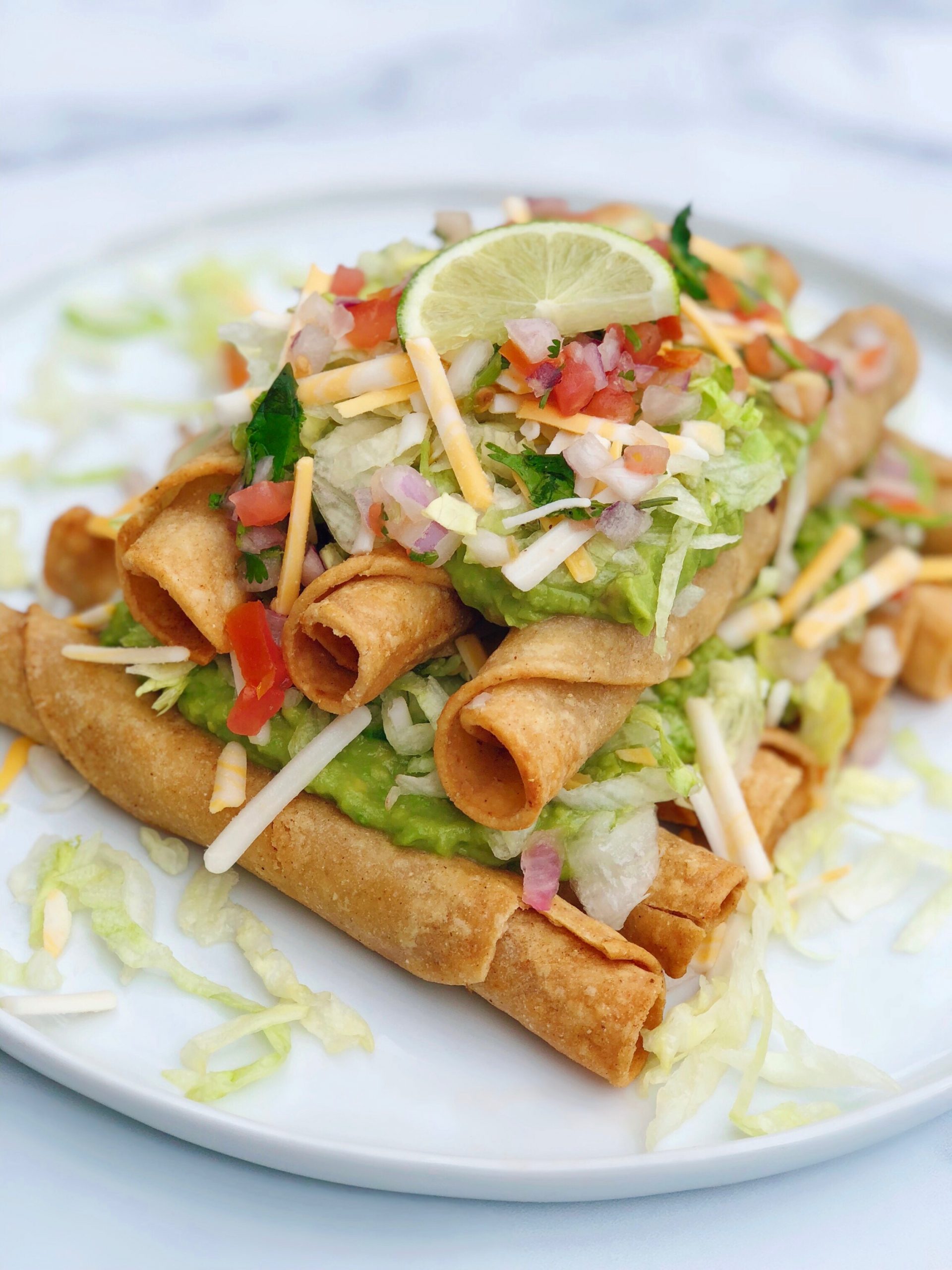 Dish of Vegan Rolled Tacos