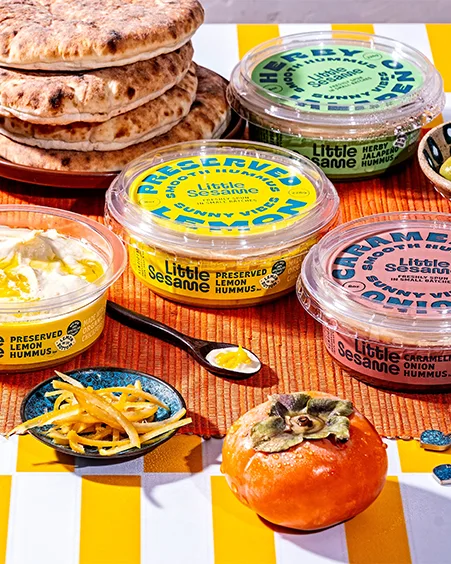 four tubs of little sesame hummus